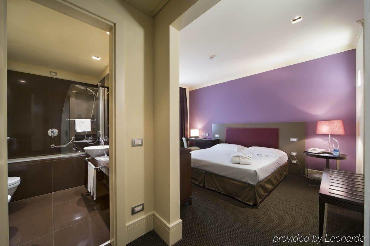 Una Hotel Лоди Номер фото
